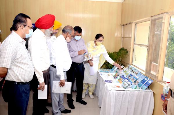 Dr. Madan Mohan, Director and Warden Fisheries visiting Exhibition with Officers of the University